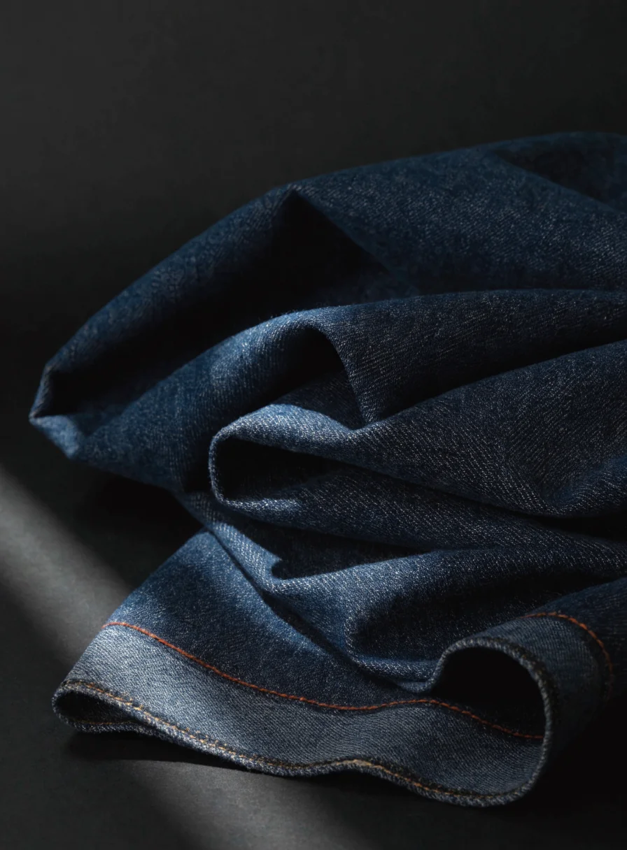 Close-up of selvedge fabric weave and tailoring craftsmanship